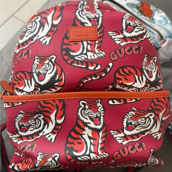 Gucci Handbags - Brand new small Gucci Red Tiger Print Backpack comes with dustbag